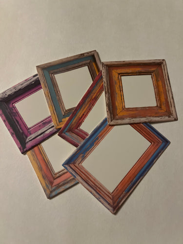 Beautifully imperfect chipboard frames by Spellbinders