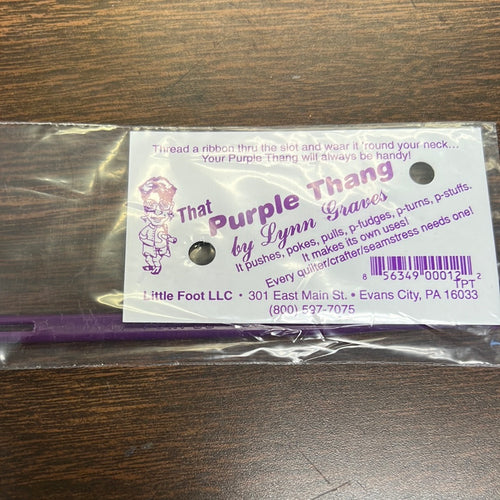 That purple thang by little foot